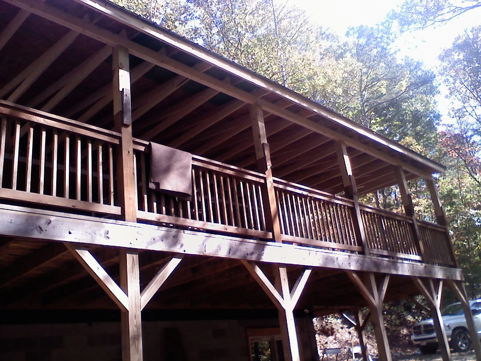Timber framing under a new elevated porch and deck — Roof Leak Repair in Palmersville by Roofing Brothers